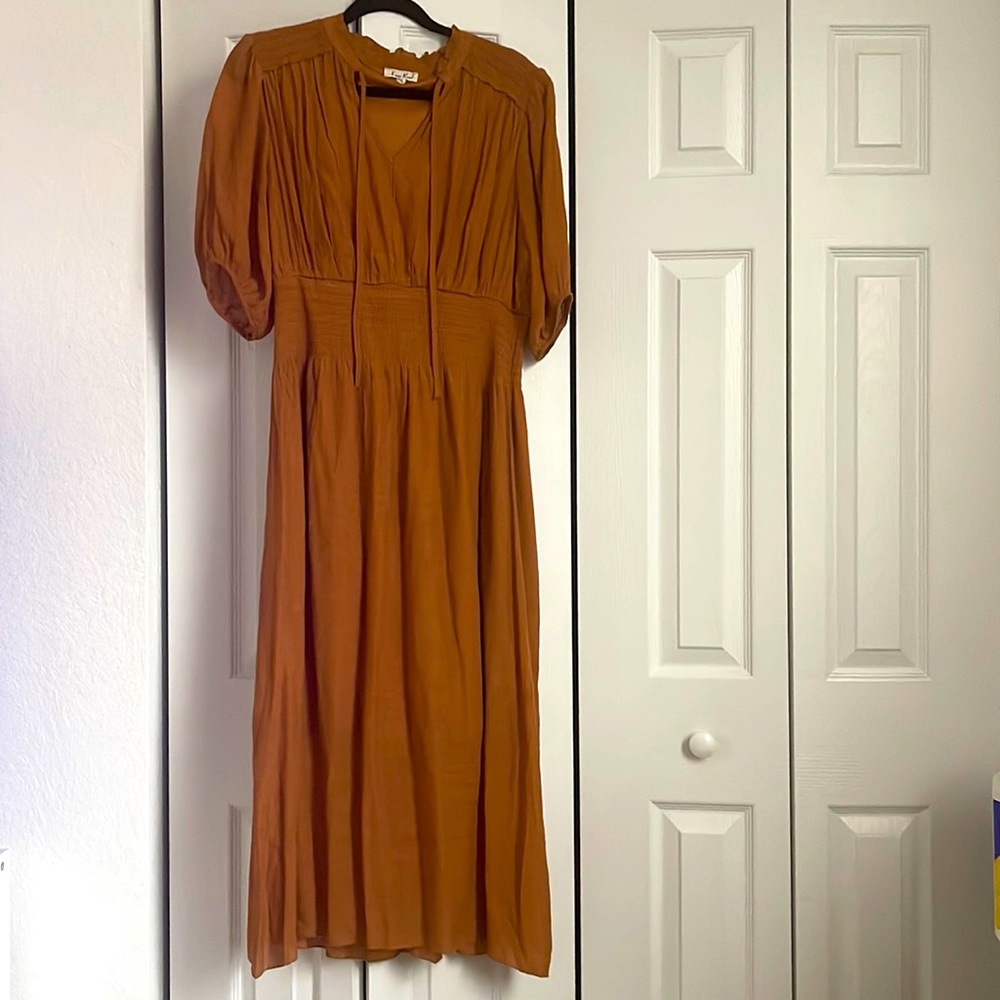 Gold/Marigold sundress. Cute and flowy! Great for dinner or work. True to size.